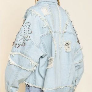 Denim jacket distressed with studs